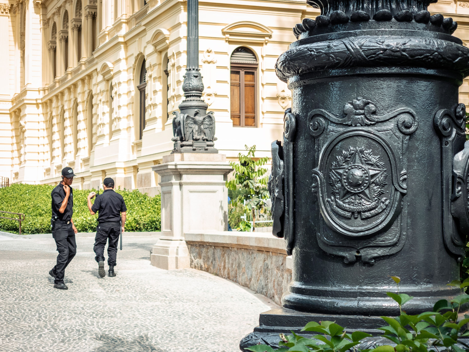 Editorial photograph of security personnel outside a public building